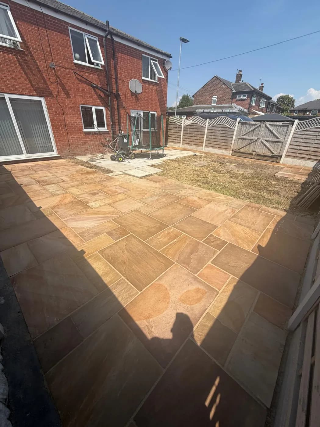 Repointed and sealed Indian sandstone patio cleaned to a fresh, even finish